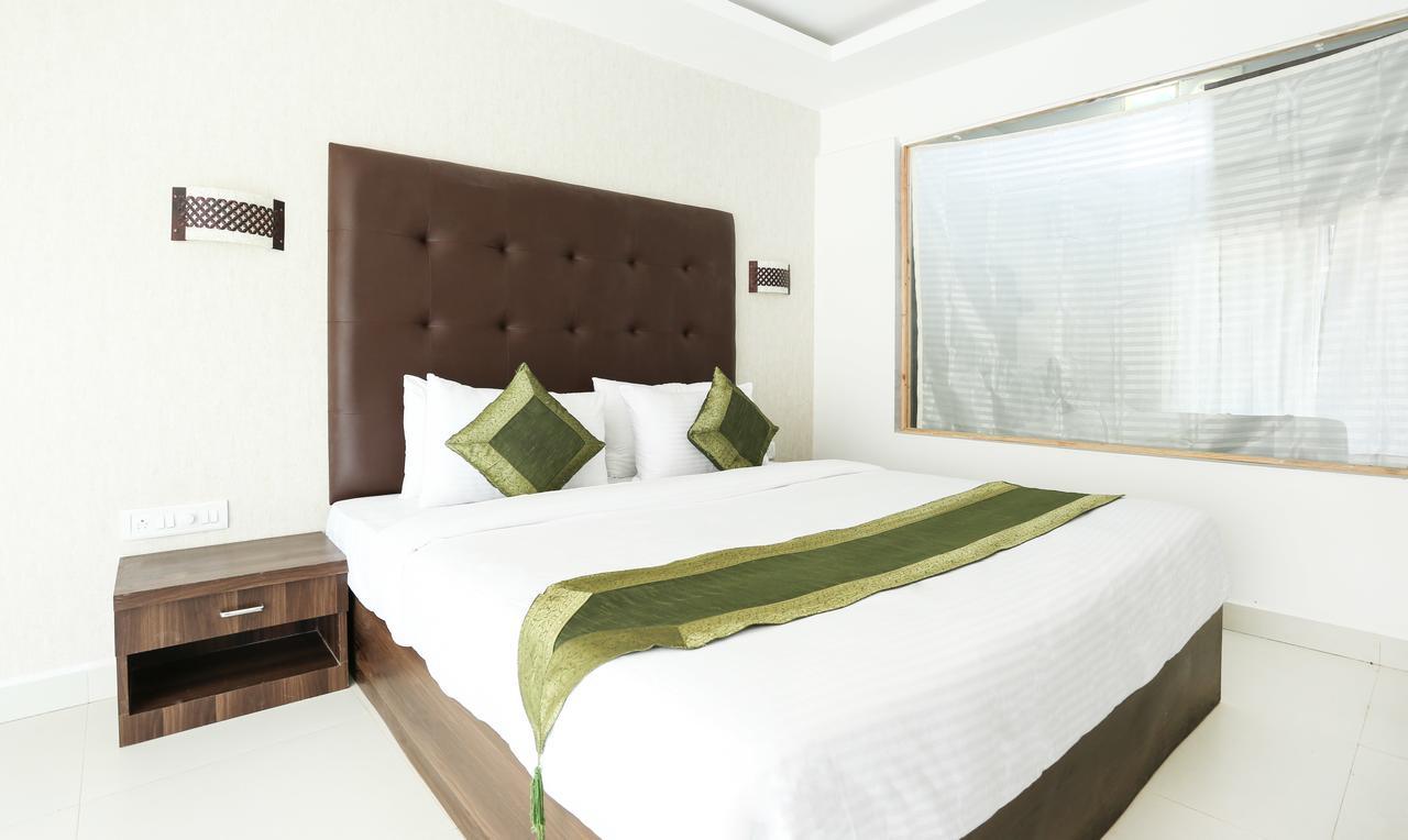Treebo Pebble Shore Hotel